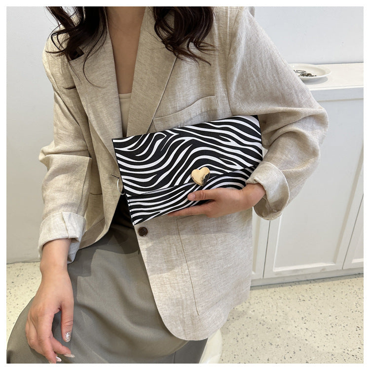Colección Wild Heart: Sobres de Mano con Estampado Animal