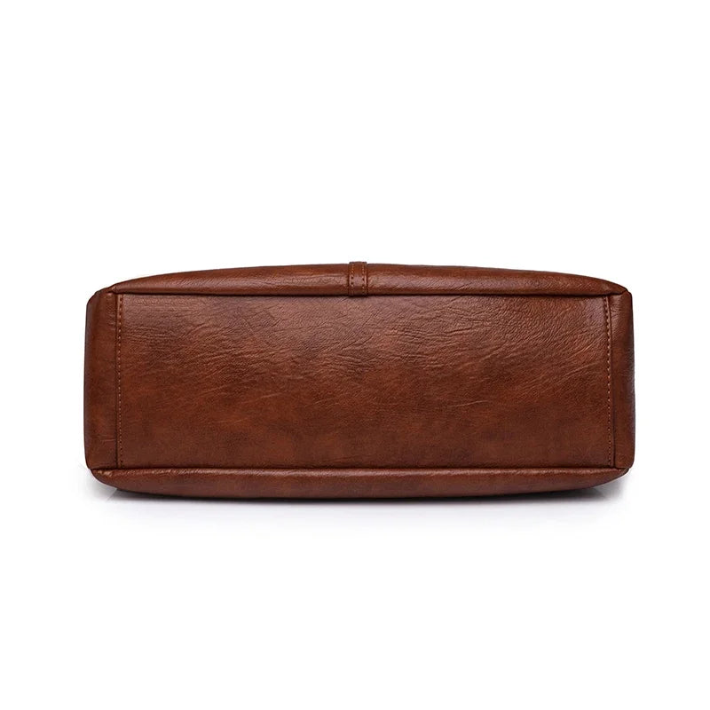 Bolso Satchel "Heritage": Elegancia en Cuero Sintético y Funcionalidad