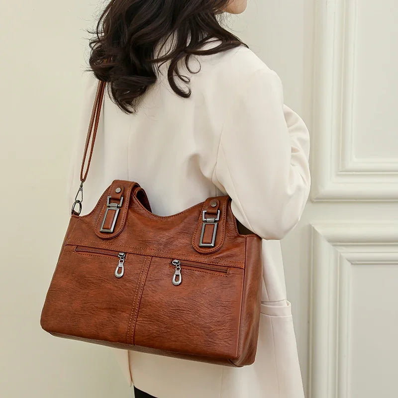 Bolso Satchel "Heritage": Elegancia en Cuero Sintético y Funcionalidad