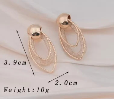 Pendientes Colgantes de Discos Esculturales