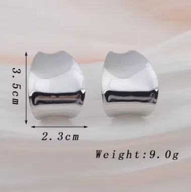 Pendientes Colgantes de Discos Esculturales