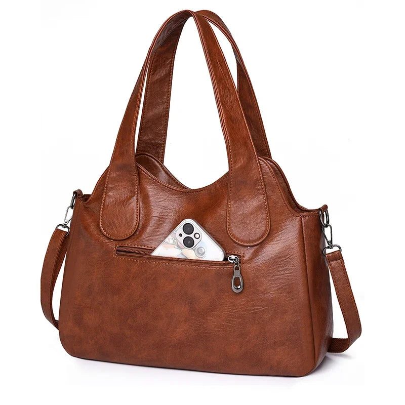 Bolso Satchel "Heritage": Elegancia en Cuero Sintético y Funcionalidad